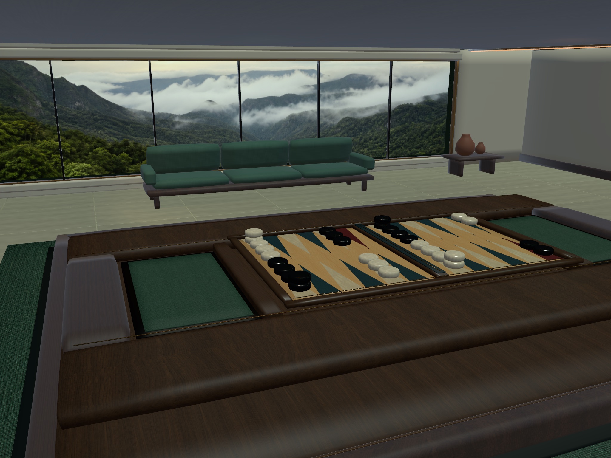 Backgammon in Madeira with green mountain slopes and low clouds.
